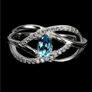 925 Silver with Pear Swiss Blue Topaz Ring. Size 8.5